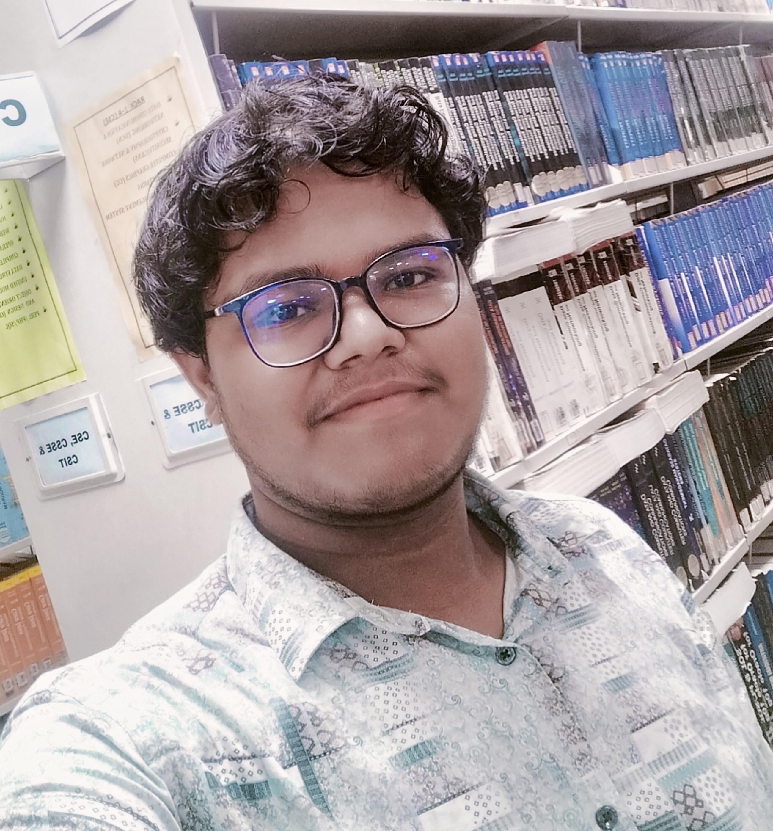 Sreeraj Dabbiru in the Central Library of Lendi Institute of Engineering and Technology (LIET)