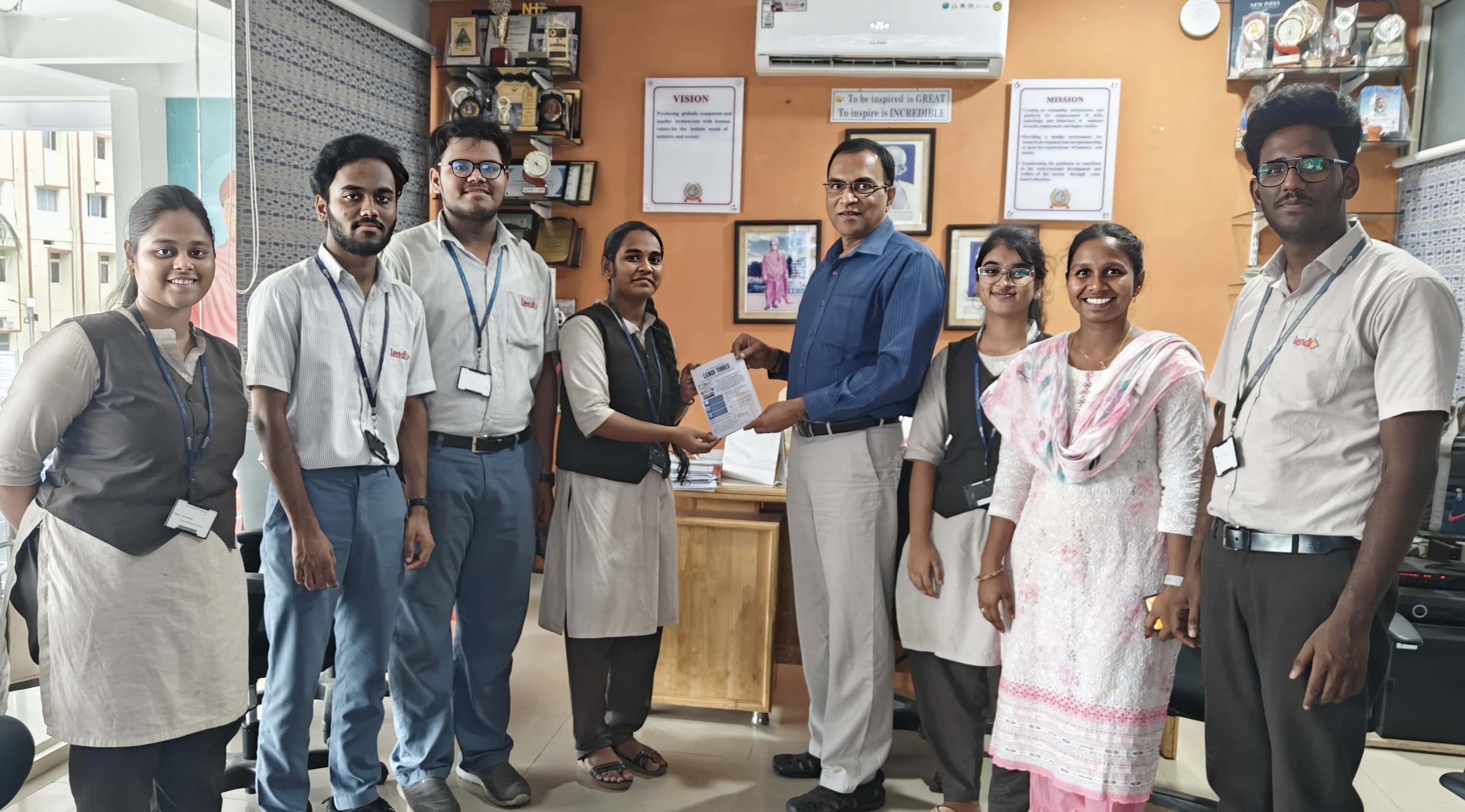 Sreeraj Dabbiru Presenting the First Newsletter of LWC to the Respected Principal sir Dr VV Rama Reddy